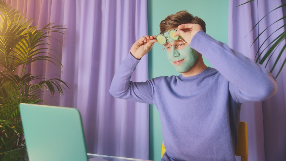 Design shot of guy with cucumber glasses, face mask in purple and green. VFX by Magoo VFX